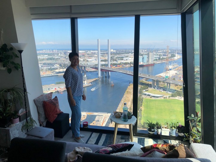 Mallie enjoying the view from Jim and Rosie's apartment in Docklands, Melbourne