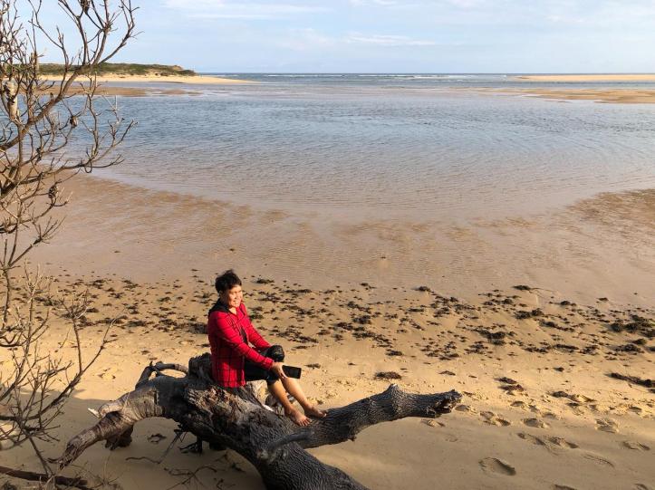Mallie poses with the mouth of the Snowy River in the background.